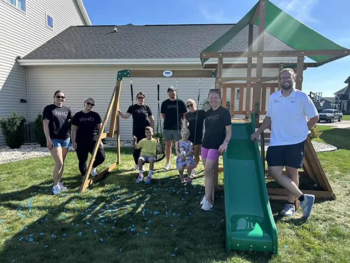 Westhill Dental supporting the Greenville community building playgrounds with the Rock Solid Foundation.